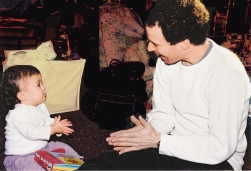 Parent and baby clapping