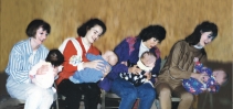 mothers and babies making soup