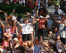 Gari Stein with a crowd of parents and children