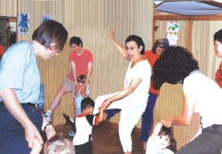 children dancing with adults